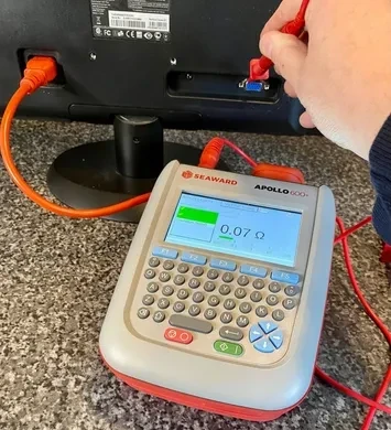 PAT tester connected for electrical equipment testing